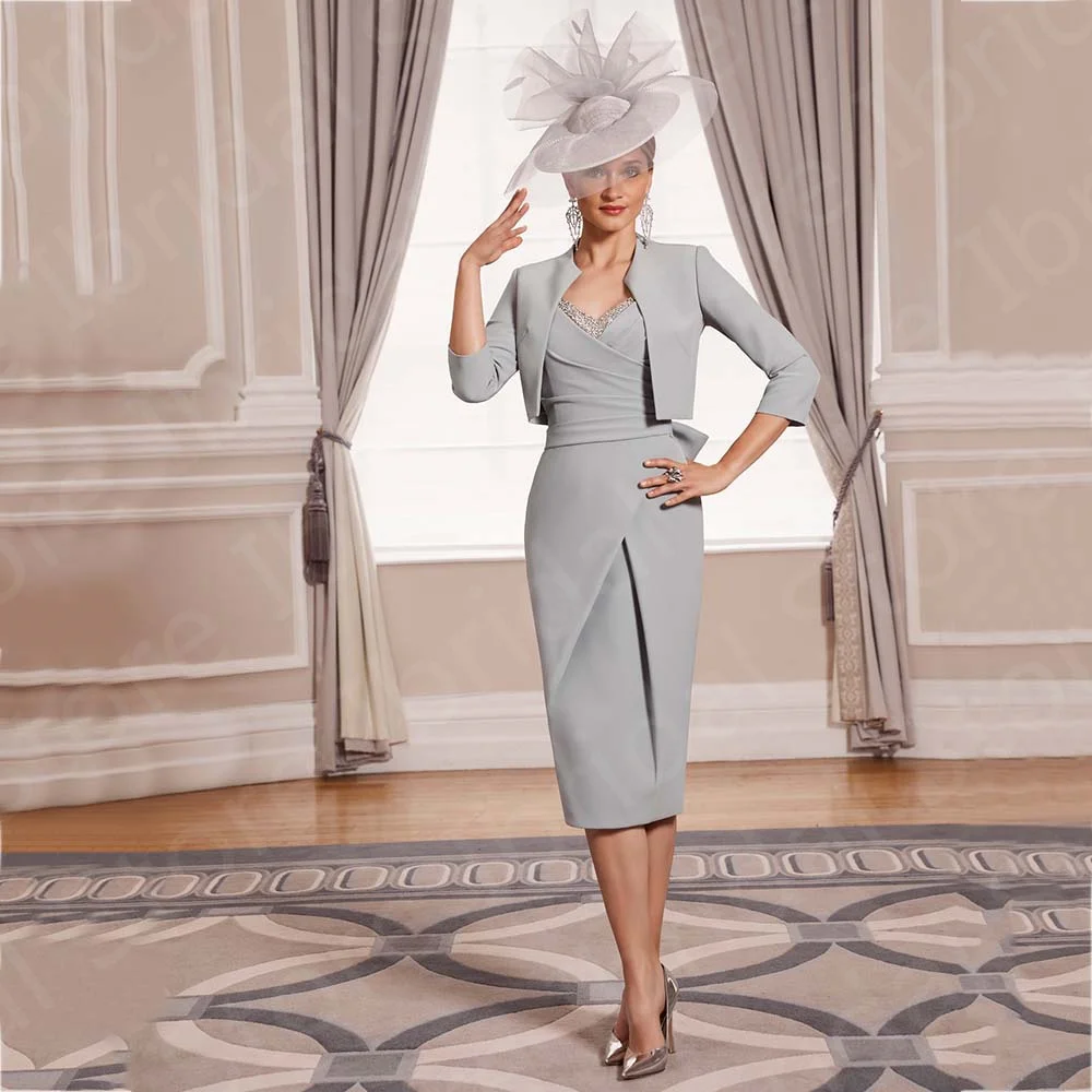 Modern Tea Length Mother Dresses with Jacket Silver Two Pieces of the Bride Beaded Wedding Guest Dress Short 2023
Modern Tea Length Mother Dresses with Jacket Silver Two Pieces of the Bride Beaded Wedding Guest Dress Short 2023