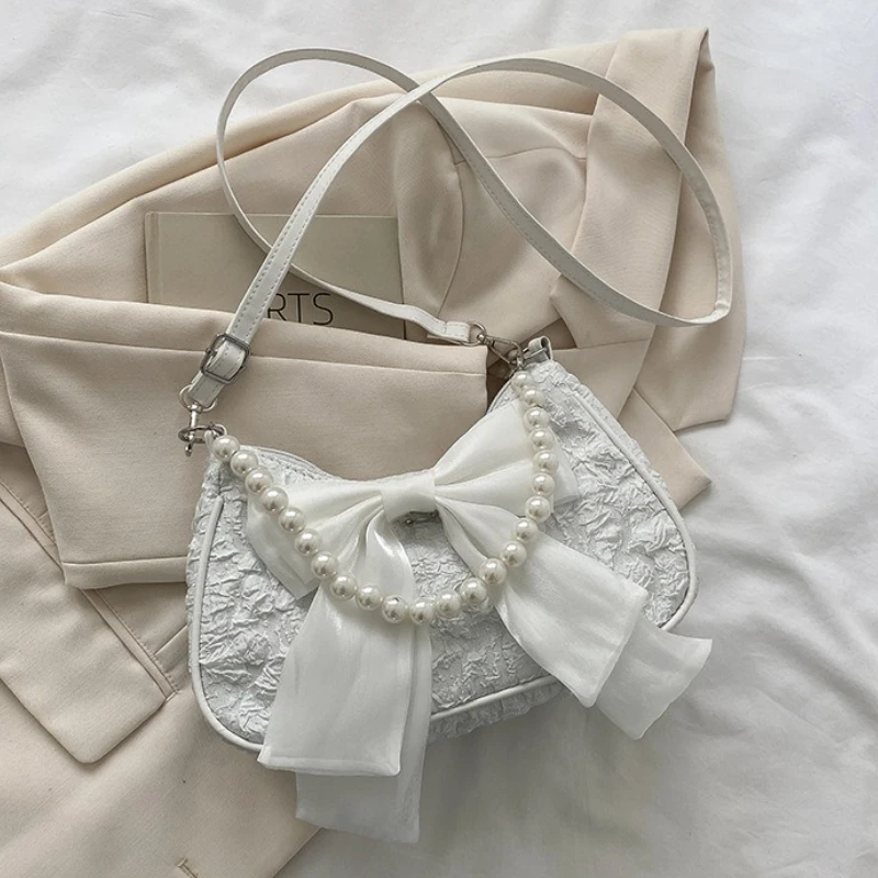 Pearl Female Bag Retro Luxury Designer Handbag Bow Crossbody Bags Fashion Canvas Women's Trend Shoulder Bag Purses Shoulder Bag 
Pearl Female Bag Retro Luxury Designer Handbag Bow Crossbody Bags Fashion Canvas Women's Trend Shoulder Bag Purses Shoulder Bag
