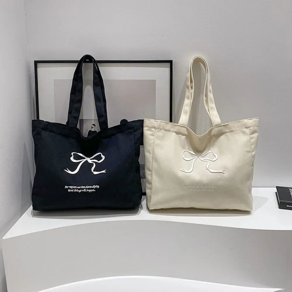 Simple Balletcore Bow Shoulder Bag Solid Color Y2k Embroidery Bow Tote Bag Zipper Commute Canvas Handbag Students
Simple Balletcore Bow Shoulder Bag Solid Color Y2k Embroidery Bow Tote Bag Zipper Commute Canvas Handbag Students