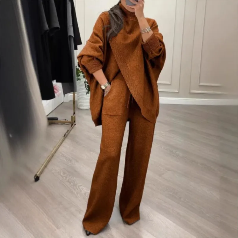 Женский повседневный вязаный костюм-двойка: однотонный свитер с высоким воротником и асимметричным разрезом, толстый, с широкими брюками
Женский повседневный вязаный костюм-двойка: однотонный свитер с высоким воротником и асимметричным разрезом, толстый, с широкими брюками