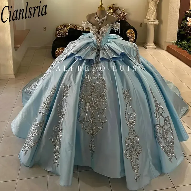 Sky Blue Off The Shoulder Bow Ruffles Quinceanera Dresses Ball Gown Beading Crystal Appliques Lace Sweet 15 Años Customized
Sky Blue Off The Shoulder Bow Ruffles Quinceanera Dresses Ball Gown Beading Crystal Appliques Lace Sweet 15 Años Customized