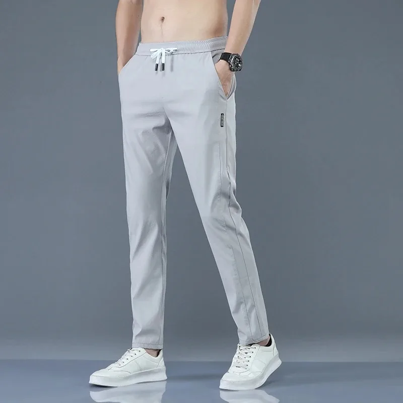 Men's New Fashion Trend Long Jogging Pants Stretch Slim Straight Port Wind Ice Silk Loose Matching Tracksuit Pants
Men's New Fashion Trend Long Jogging Pants Stretch Slim Straight Port Wind Ice Silk Loose Matching Tracksuit Pants