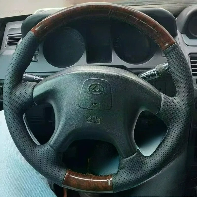 Hand-stitched renovate peach wood color black leather steering wheel cover For Mitsubishi Cheetah Black King Kong 6481 V31 V33
Hand-stitched renovate peach wood color black leather steering wheel cover For Mitsubishi Cheetah Black King Kong 6481 V31 V33
