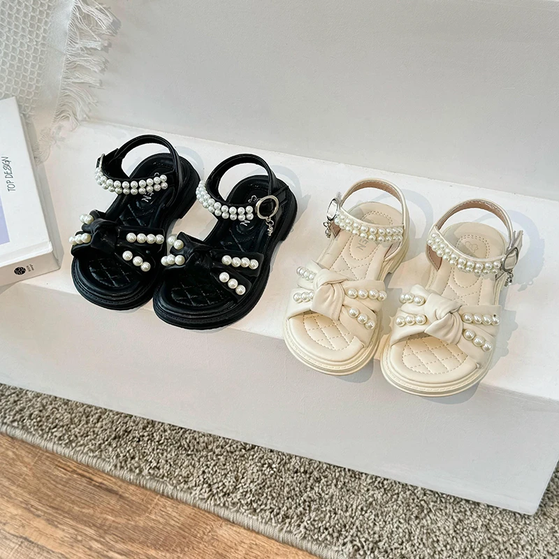 Girls' Pearl Sandals 2025 Summer New Soft Bottom Girls' Fashion and Western Princess Shoes Children's Baby Beach Shoes
Girls' Pearl Sandals 2025 Summer New Soft Bottom Girls' Fashion and Western Princess Shoes Children's Baby Beach Shoes