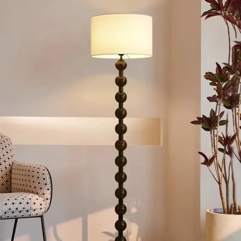 French retro medieval wabi-sabi wind floor lamp, high-end atmosphere solid wood lamps next to the sofa in the living room
French retro medieval wabi-sabi wind floor lamp, high-end atmosphere solid wood lamps next to the sofa in the living room