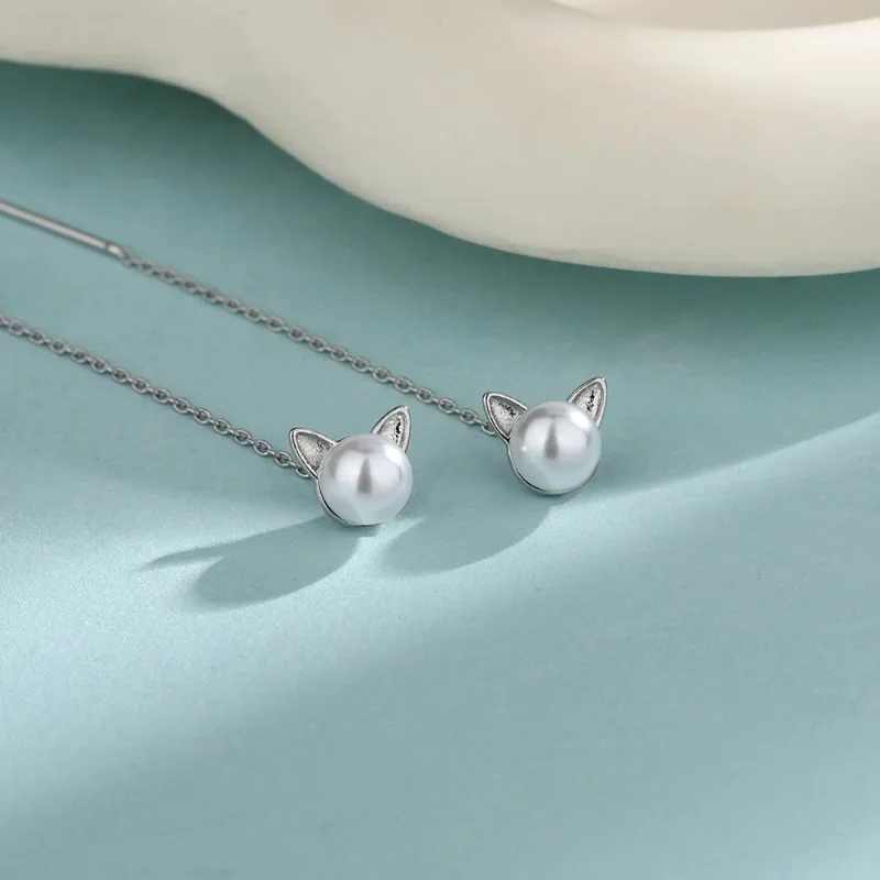 925 Sterling Silver Charming Pearl Cat Ear Chain Tassel Drop Earring for Women Fine Jewelry High Luxury Vintage Accessories
925 Sterling Silver Charming Pearl Cat Ear Chain Tassel Drop Earring for Women Fine Jewelry High Luxury Vintage Accessories