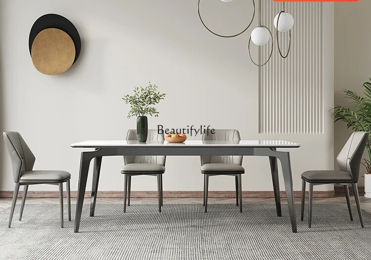 Italian minimalist stainless steel bright rock slab dining table household high-end
Italian minimalist stainless steel bright rock slab dining table household high-end