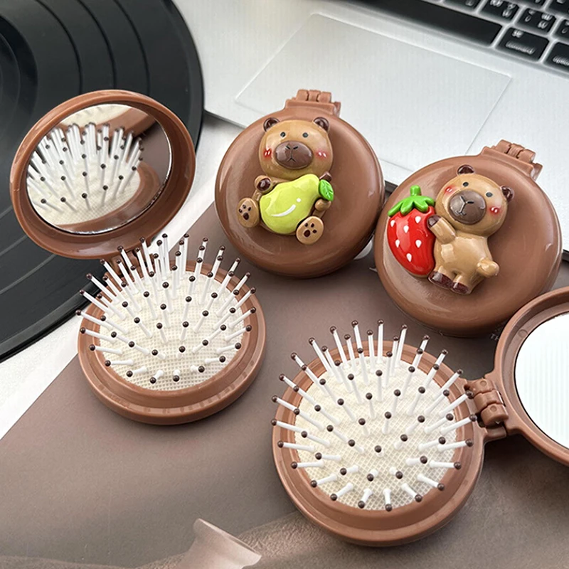 Складная массажная расческа Capybara с зеркалом, массажная подушка безопасности, антистатическая портативная дорожная расческа для девочек, инструмент для укладки волос
Складная массажная расческа Capybara с зеркалом, массажная подушка безопасности, антистатическая портативная дорожная расческа для девочек, инструмент для укладки волос