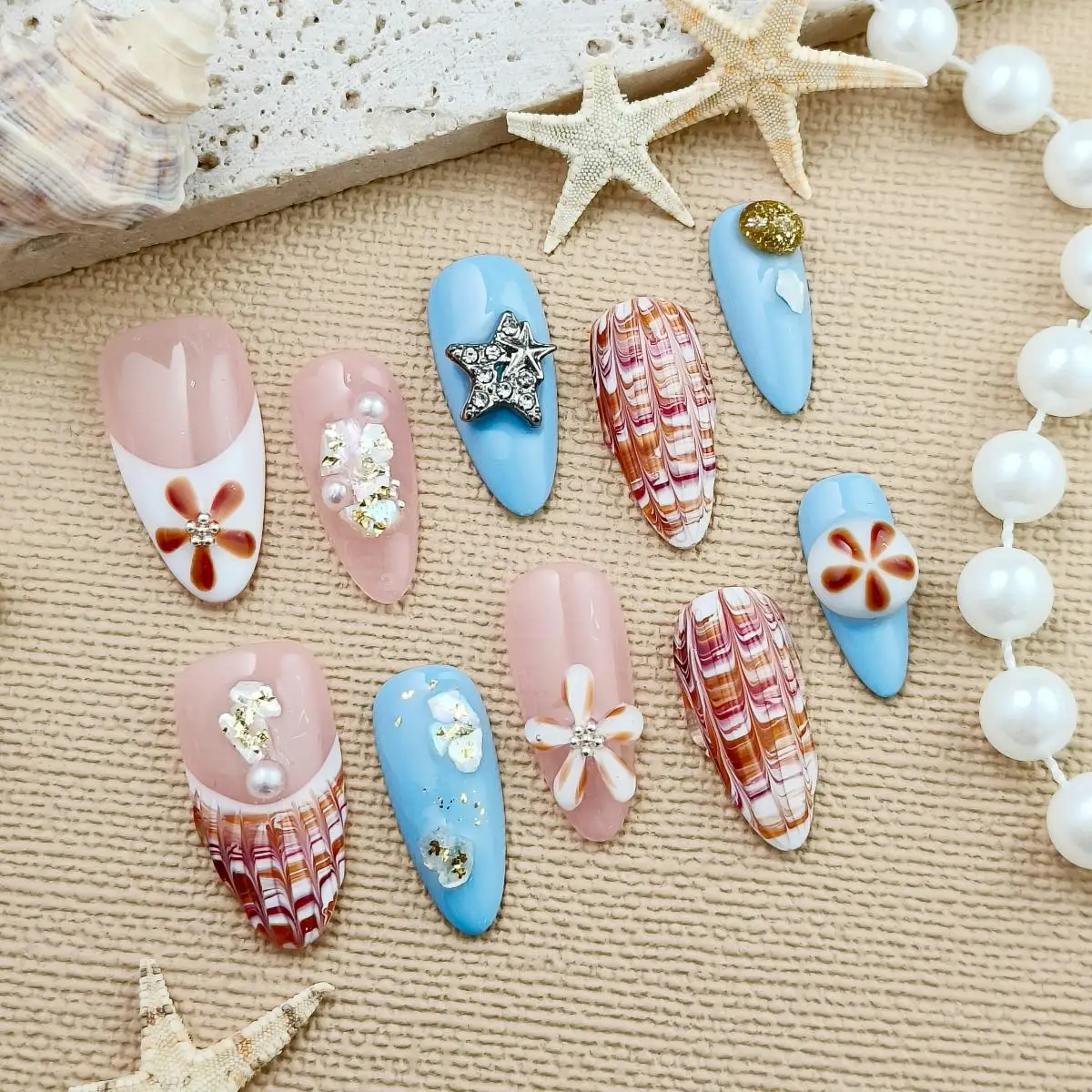10pcs Ocean series Handmade Press-on nails Medium Almond Nails Bundle 3D Hand drawn Shell Sweet 3D Flowers Pearl Star Finished n
10pcs Ocean series Handmade Press-on nails Medium Almond Nails Bundle 3D Hand drawn Shell Sweet 3D Flowers Pearl Star Finished n