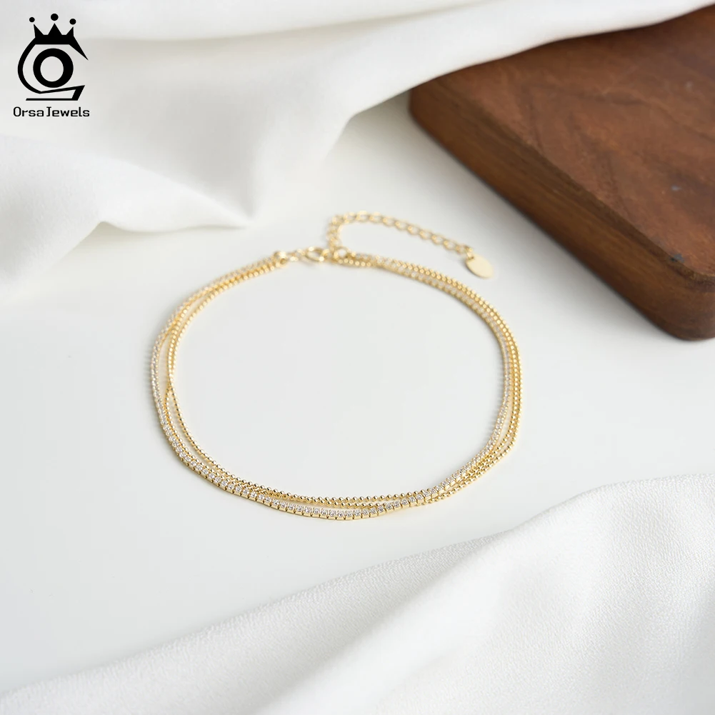 ORSA JEWELS Elegant Three Layered S925 Silver Chain Anklets with Shiny CZ for Women Sexy Foot Bracelet Accessories Jewelry SA103
ORSA JEWELS Elegant Three Layered S925 Silver Chain Anklets with Shiny CZ for Women Sexy Foot Bracelet Accessories Jewelry SA103