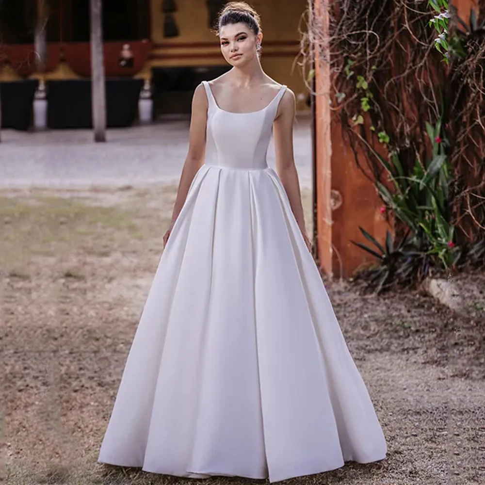 Simple Bridal Scoop Neck Sleeveless Wedding Dress Classic A-Line Half Open Back with Buttons Sweep Train Bride Gowns Robe
Simple Bridal Scoop Neck Sleeveless Wedding Dress Classic A-Line Half Open Back with Buttons Sweep Train Bride Gowns Robe