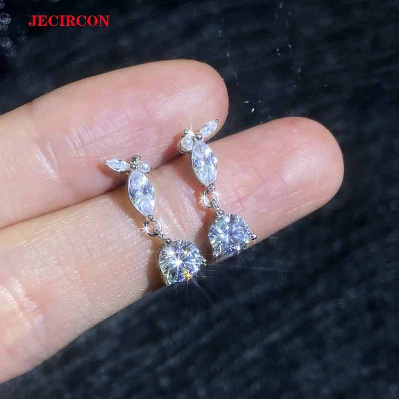 Женские серьги JECIRCON из стерлингового серебра 925 пробы с муассанитом 0,5 карата, модные висячие серьги с кисточками и каплями воды, универсальные ювелирные изделия
Женские серьги JECIRCON из стерлингового серебра 925 пробы с муассанитом 0,5 карата, модные висячие серьги с кисточками и каплями воды, универсальные ювелирные изделия