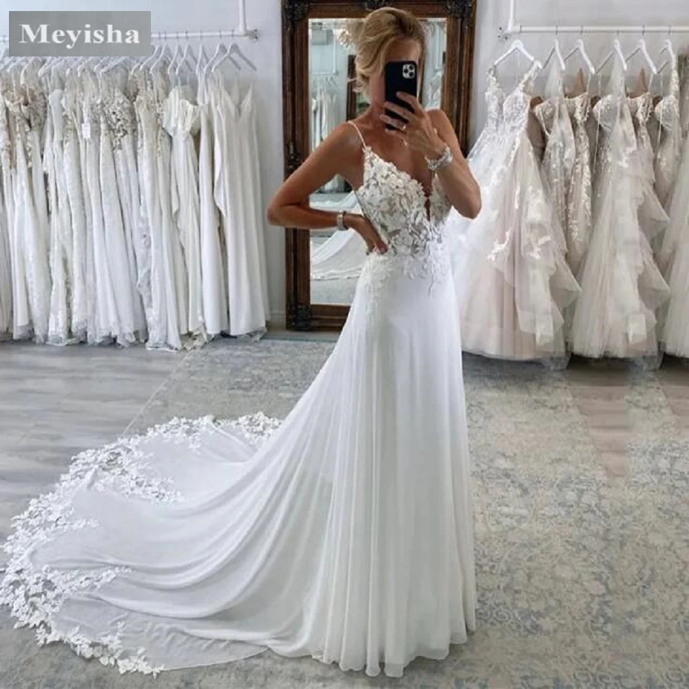 Customized ZJ6032 Beach A Line Chiffion Wedding Dresses Sexy V-neck Spaghetti Straps Backless Button Appliques Boho Bridal Gowns
Customized ZJ6032 Beach A Line Chiffion Wedding Dresses Sexy V-neck Spaghetti Straps Backless Button Appliques Boho Bridal Gowns
