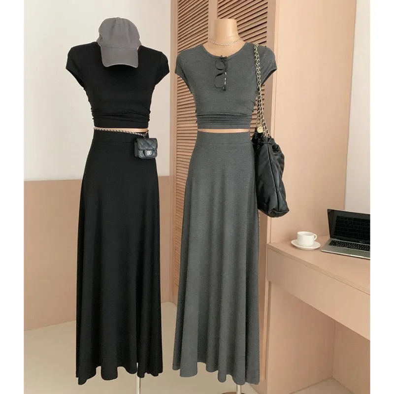 2024 Summer New Korean Fashion Grey Round Neck Slim Fit T-shirt Women's Large Skirt Hem Temperament Half Skirt Two Piece Set
2024 Summer New Korean Fashion Grey Round Neck Slim Fit T-shirt Women's Large Skirt Hem Temperament Half Skirt Two Piece Set