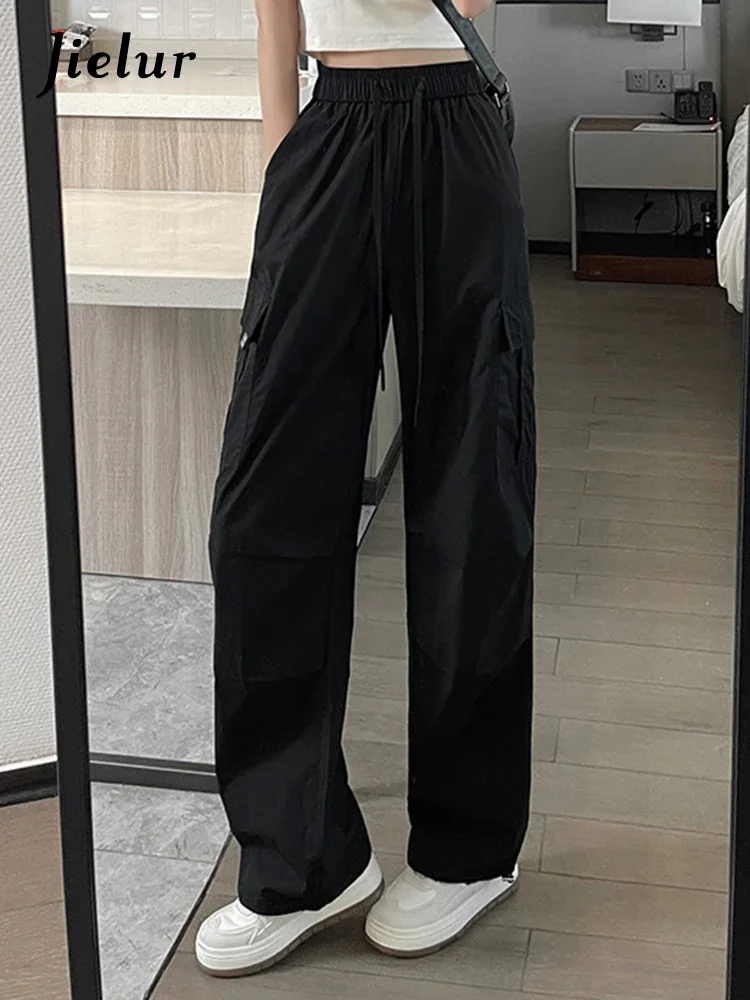 Jielur шикарные карманы на шнурке, однотонные женские брюки-карго, осенние повседневные винтажные прямые женские спортивные штаны с высокой талией в американском стиле
Jielur шикарные карманы на шнурке, однотонные женские брюки-карго, осенние повседневные винтажные прямые женские спортивные штаны с высокой талией в американском стиле