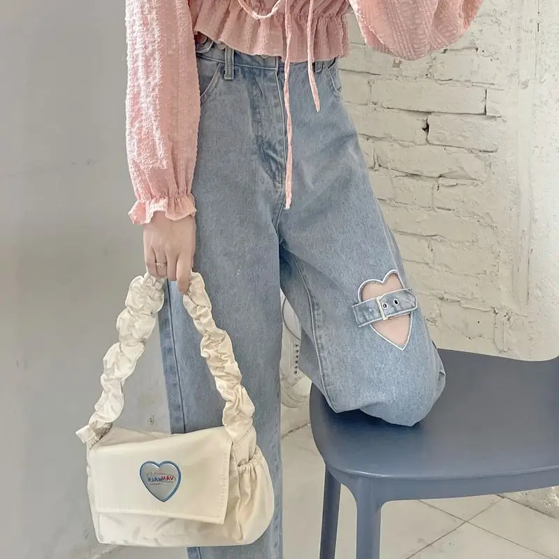 Джинсы с высокой талией и дырками в форме сердца, женские летние джинсы больших размеров, новые свободные широкие брюки прямого кроя с эффектом похудения
Джинсы с высокой талией и дырками в форме сердца, женские летние джинсы больших размеров, новые свободные широкие брюки прямого кроя с эффектом похудения