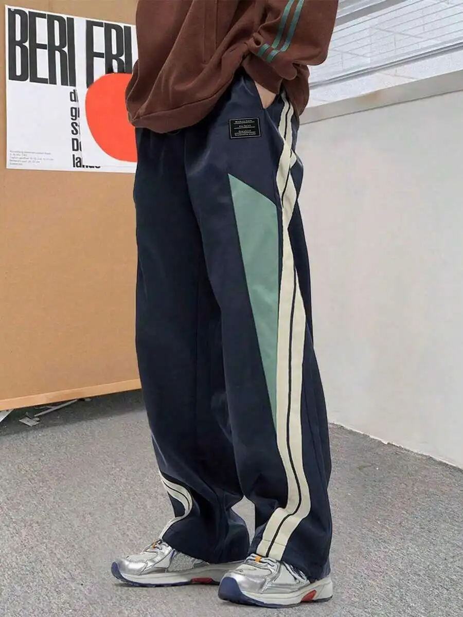 Mens Retro Patchwork Track Pants With Side Stripes, Loose Fit Straight Leg Casual Trousers For Spring And Autumn
Mens Retro Patchwork Track Pants With Side Stripes, Loose Fit Straight Leg Casual Trousers For Spring And Autumn