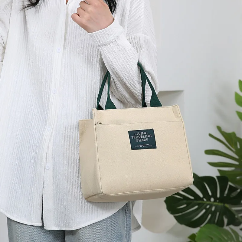 Japanese Commuting Eco-friendly Canvas Tote Bag, Lunch Box Bag, Carrying Lunch Box Bag, Students Join Hands To Carry The Bag
Japanese Commuting Eco-friendly Canvas Tote Bag, Lunch Box Bag, Carrying Lunch Box Bag, Students Join Hands To Carry The Bag