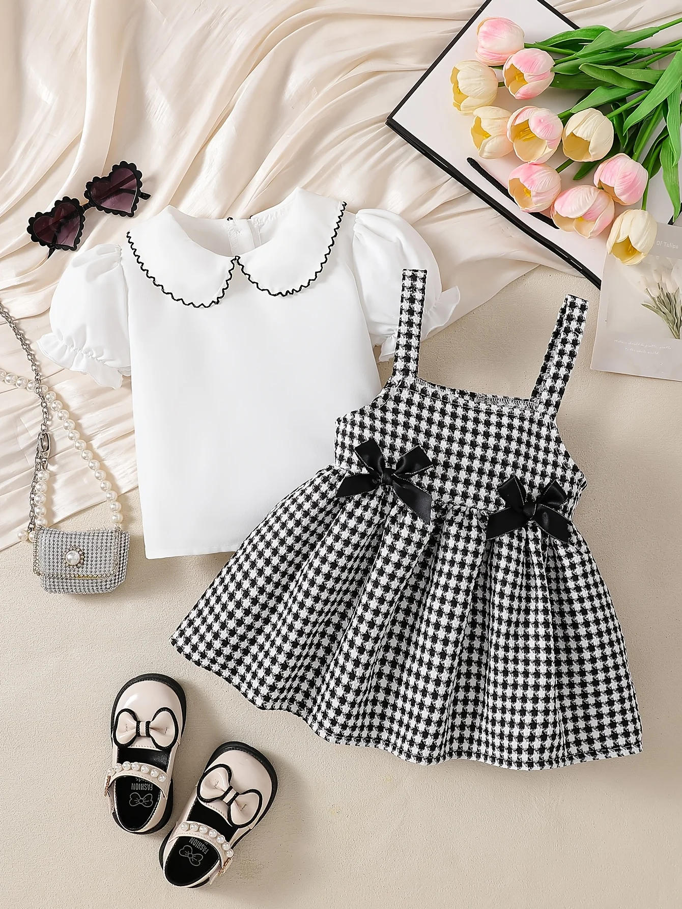 Baby Girl 2-Piece Outfit: Peter Pan Collar Top + Houndstooth Dress with Bows | Ideal Valentine & Birthday Gift
Baby Girl 2-Piece Outfit: Peter Pan Collar Top + Houndstooth Dress with Bows | Ideal Valentine & Birthday Gift