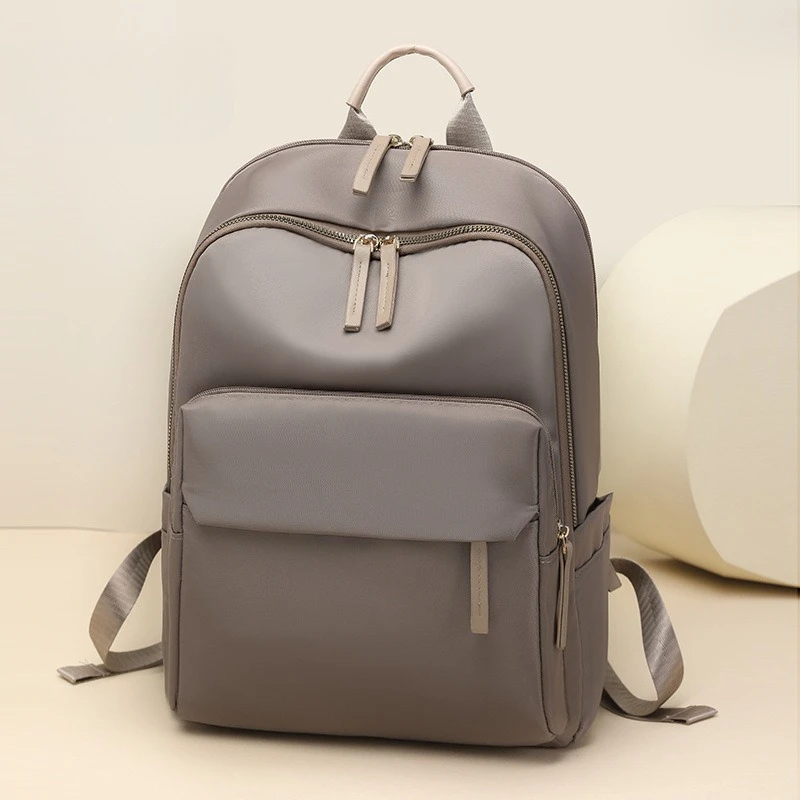Женский рюкзак из новой ткани Оксфорд, корейская версия, легкий дорожный рюкзак, стильный и вместительный, студенческая сумка с большим объемом.
Женский рюкзак из новой ткани Оксфорд, корейская версия, легкий дорожный рюкзак, стильный и вместительный, студенческая сумка с большим объемом.