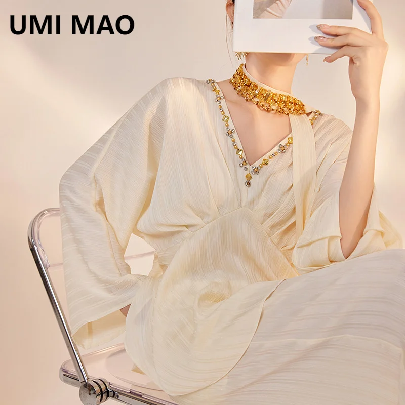 UMI MAO Осенний высококачественный темпераментный дизайн, топ ручной работы с бусинами для ногтей, висячие прямые брюки с широкими штанинами, женский комплект с длинным рукавом
UMI MAO Осенний высококачественный темпераментный дизайн, топ ручной работы с бусинами для ногтей, висячие прямые брюки с широкими штанинами, женский комплект с длинным рукавом