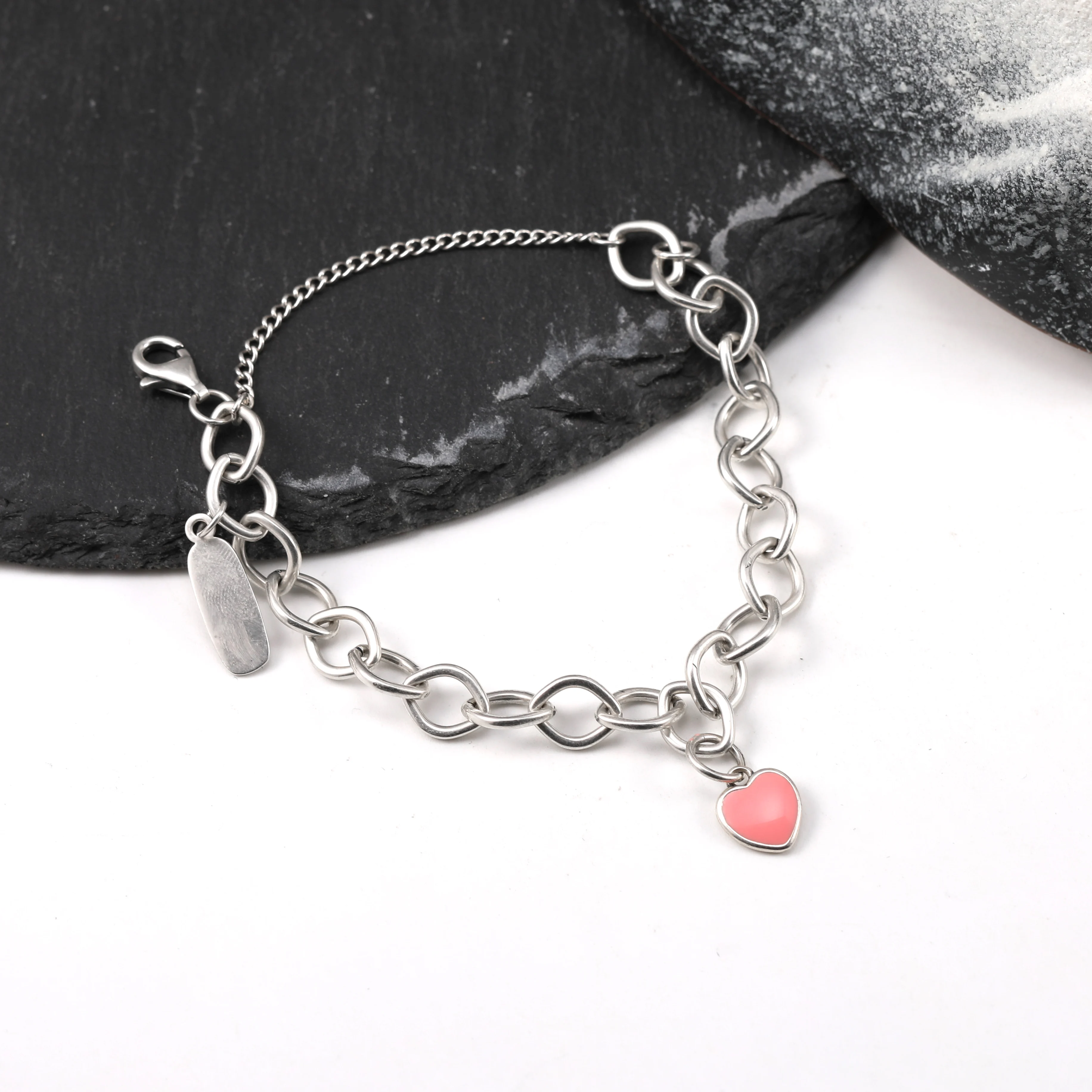 Genuine 925 sterling silver Forged Link Charm Bracelet paired with an Enamel connected heart pendant
Genuine 925 sterling silver Forged Link Charm Bracelet paired with an Enamel connected heart pendant