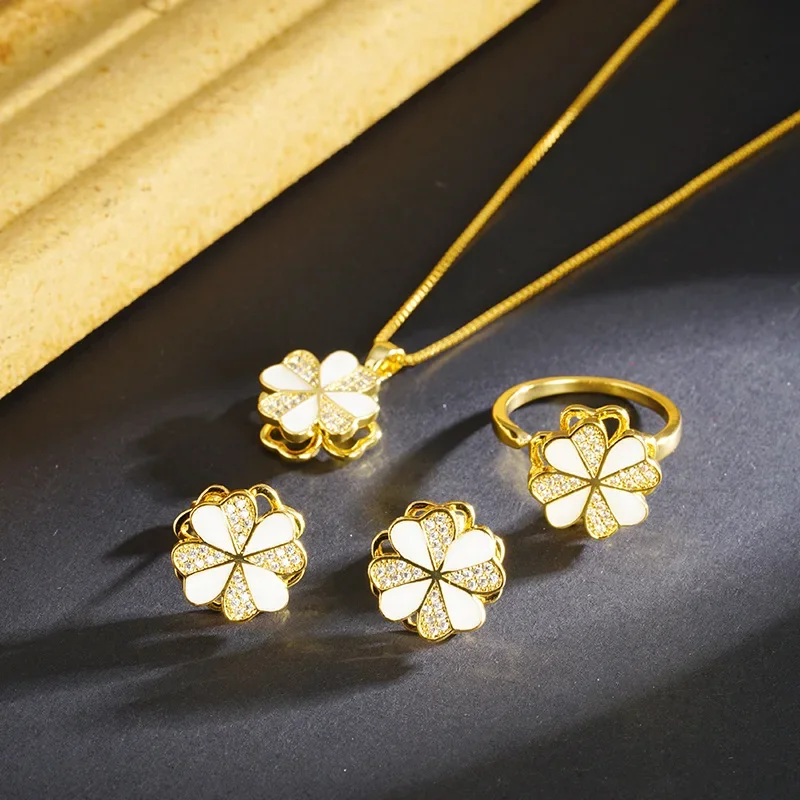 Classical 18 K Gold Color White Shell Zircon Inlaid Flower Necklace Sets Wedding Suits Bridal Jewelry Sets Necklace Ring Earring
Classical 18 K Gold Color White Shell Zircon Inlaid Flower Necklace Sets Wedding Suits Bridal Jewelry Sets Necklace Ring Earring