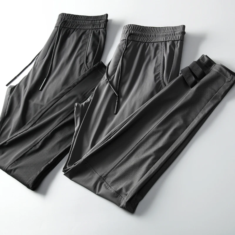 Men's Summer Slim Fit Laser Perforated Elastic Breathable Thin Sweatpants Casual Trousers with Drawstring Fashionable Streetwear
Men's Summer Slim Fit Laser Perforated Elastic Breathable Thin Sweatpants Casual Trousers with Drawstring Fashionable Streetwear