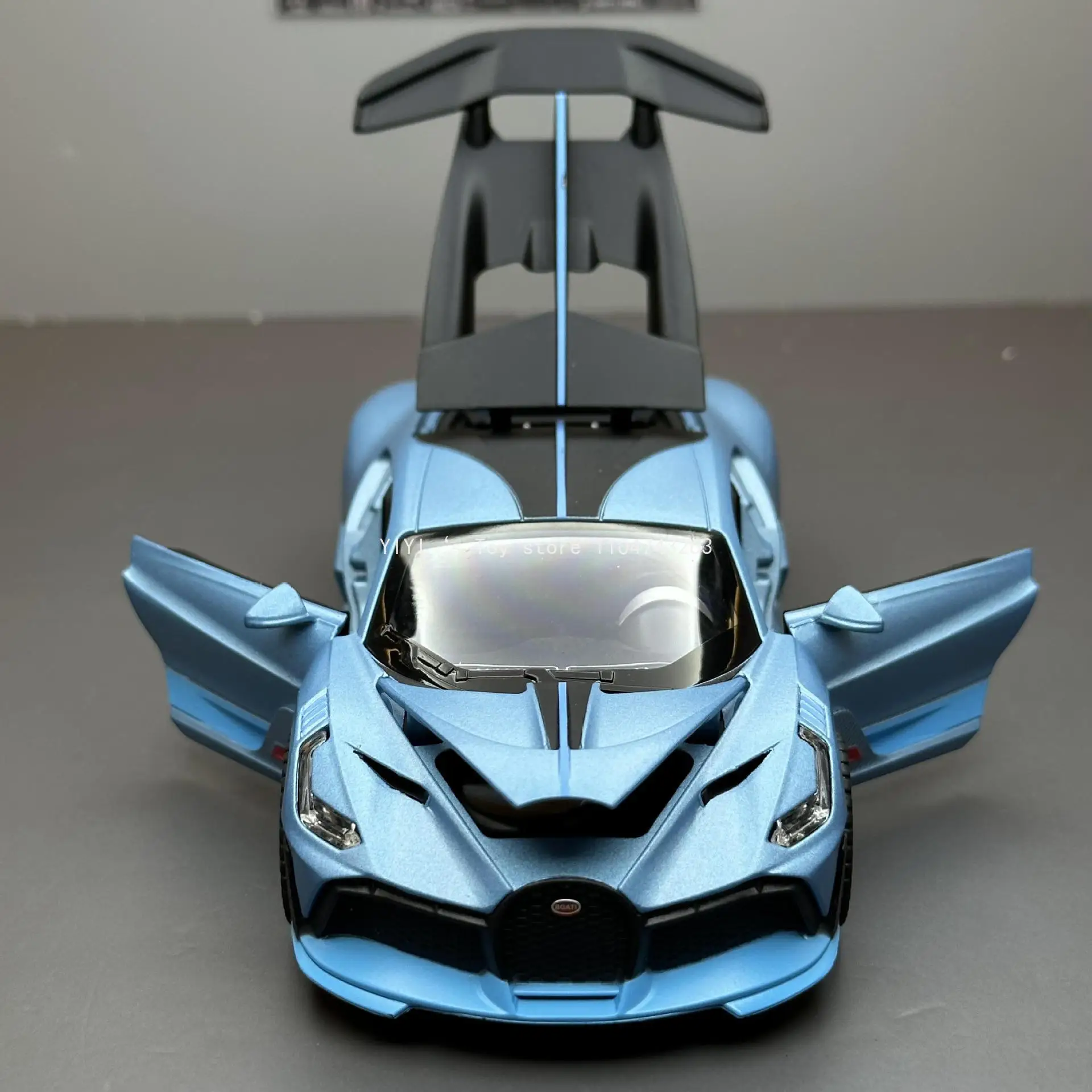 Simulation 1: 32 Bugatti Divo Model sound and light die-casting toy car and collectible gifts A20
Simulation 1: 32 Bugatti Divo Model sound and light die-casting toy car and collectible gifts A20