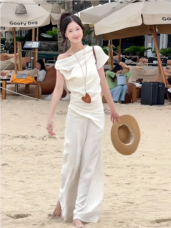 Summer 2026 White Shoulder Bared Top And High Waist Skirt Two Piece Set Beach Vacation Style Women's Design Elegant Fashion
Summer 2026 White Shoulder Bared Top And High Waist Skirt Two Piece Set Beach Vacation Style Women's Design Elegant Fashion