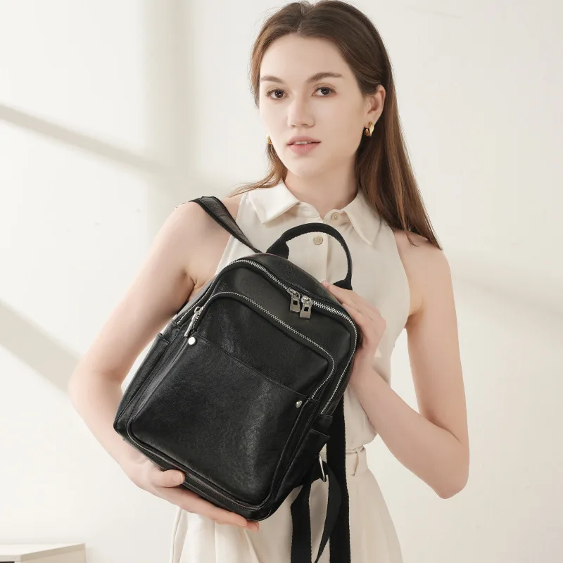 Real leather multi-pocket women's high-end double-shoulder bag, lightweight, water-resistant, simple and stylish travel bag
Real leather multi-pocket women's high-end double-shoulder bag, lightweight, water-resistant, simple and stylish travel bag