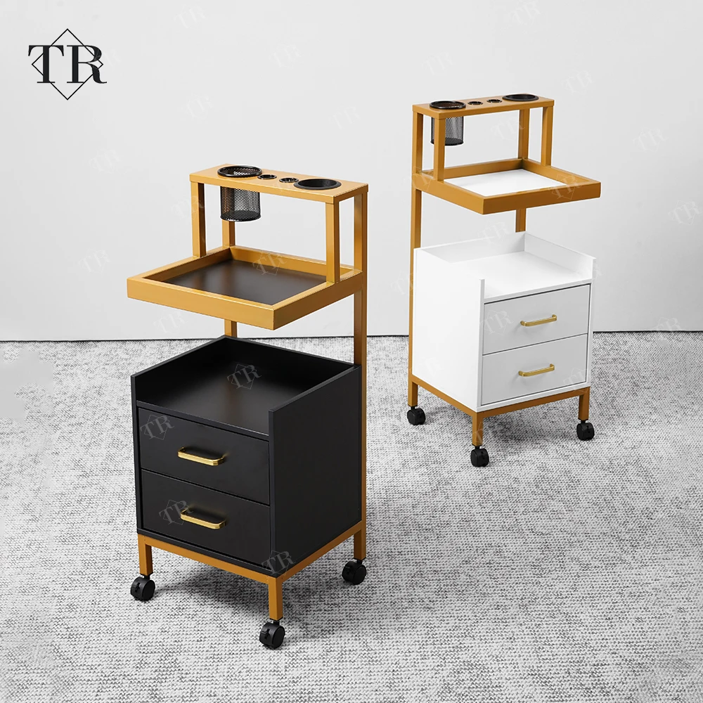 Turri Makeup Trolley Cart Stainless Steel Metal Gold Plated Salon Barber Trolley With Directional Wheels for Barber Shop
Turri Makeup Trolley Cart Stainless Steel Metal Gold Plated Salon Barber Trolley With Directional Wheels for Barber Shop