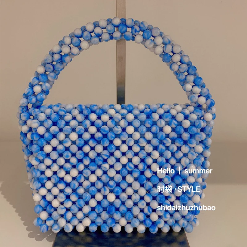 Customized Beaded Bag New Acrylic Handmade Woven Mixed Color Flip Women's Bags Fashionable Ins Mobile Phone Ladies Handbag
Customized Beaded Bag New Acrylic Handmade Woven Mixed Color Flip Women's Bags Fashionable Ins Mobile Phone Ladies Handbag
