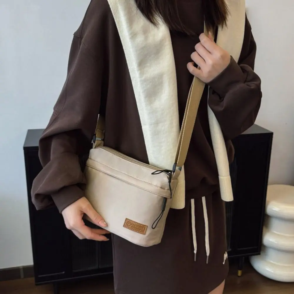 All-match Korean Style Square Message Bag Large Capacity Solid Color Nylon Crossbody Bag Causal Sports Shoulder Bag Unisex
All-match Korean Style Square Message Bag Large Capacity Solid Color Nylon Crossbody Bag Causal Sports Shoulder Bag Unisex