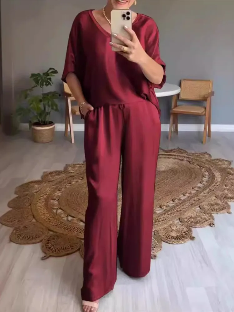 Women 2025 Summer Fashion 2pcs Sets Solid Satin V-neck Short Sleeve Loose Top Casual Pocket High Waist Pants 2-piece Set Outfit
Women 2025 Summer Fashion 2pcs Sets Solid Satin V-neck Short Sleeve Loose Top Casual Pocket High Waist Pants 2-piece Set Outfit
