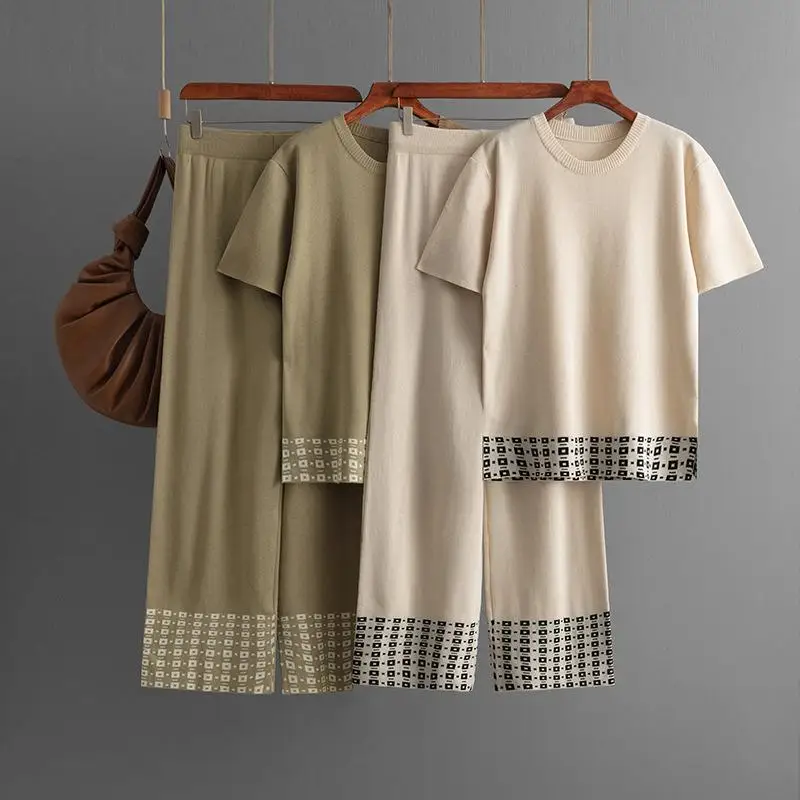 Women Summer Casual Loose Knit Set O-neck Short Sleeved Split Tops and High Waist Wide Leg Pants Simple Contrast Color Edge Suit
Women Summer Casual Loose Knit Set O-neck Short Sleeved Split Tops and High Waist Wide Leg Pants Simple Contrast Color Edge Suit