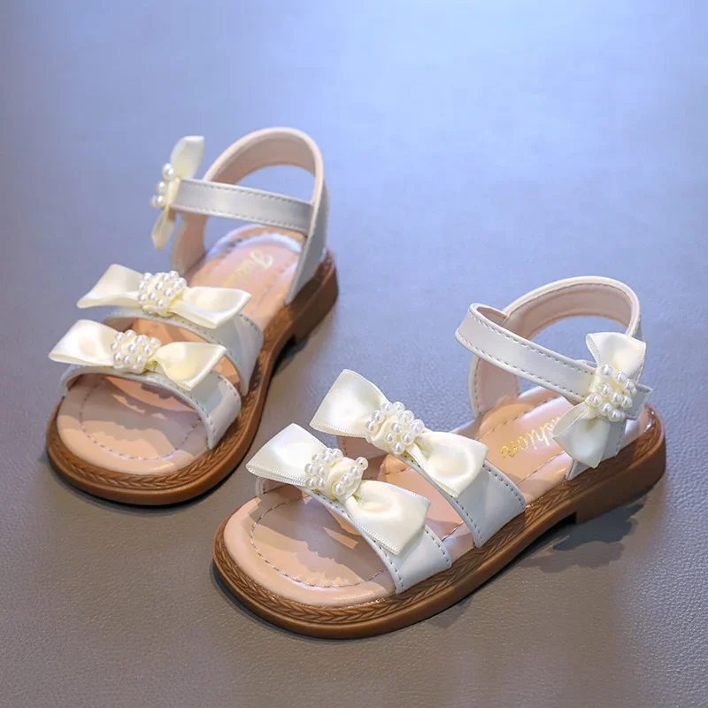 Children's Sandals 2025 Summer New Pearl Bow Open Toe Girl's Princess Shoes Soft Bottom Anti Slip Kids' Casual Beach Shoes
Children's Sandals 2025 Summer New Pearl Bow Open Toe Girl's Princess Shoes Soft Bottom Anti Slip Kids' Casual Beach Shoes