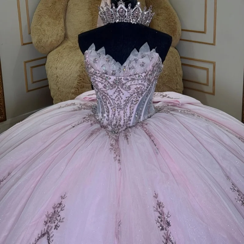 Light Pink Quinceanera Dress off-shoulder Sequins Crystal Decal Lace Layering Long tail Bow vestidos de 15 Quinceanera Customiz
Light Pink Quinceanera Dress off-shoulder Sequins Crystal Decal Lace Layering Long tail Bow vestidos de 15 Quinceanera Customiz