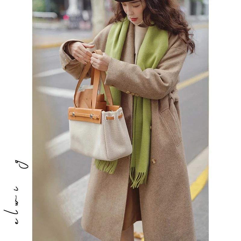 Оригинальное утепленное длинное пальто Elwing Oaeal из чистой шерсти, свободного кроя, женское зимнее шерстяное пальто для повседневной носки, двубортное
Оригинальное утепленное длинное пальто Elwing Oaeal из чистой шерсти, свободного кроя, женское зимнее шерстяное пальто для повседневной носки, двубортное