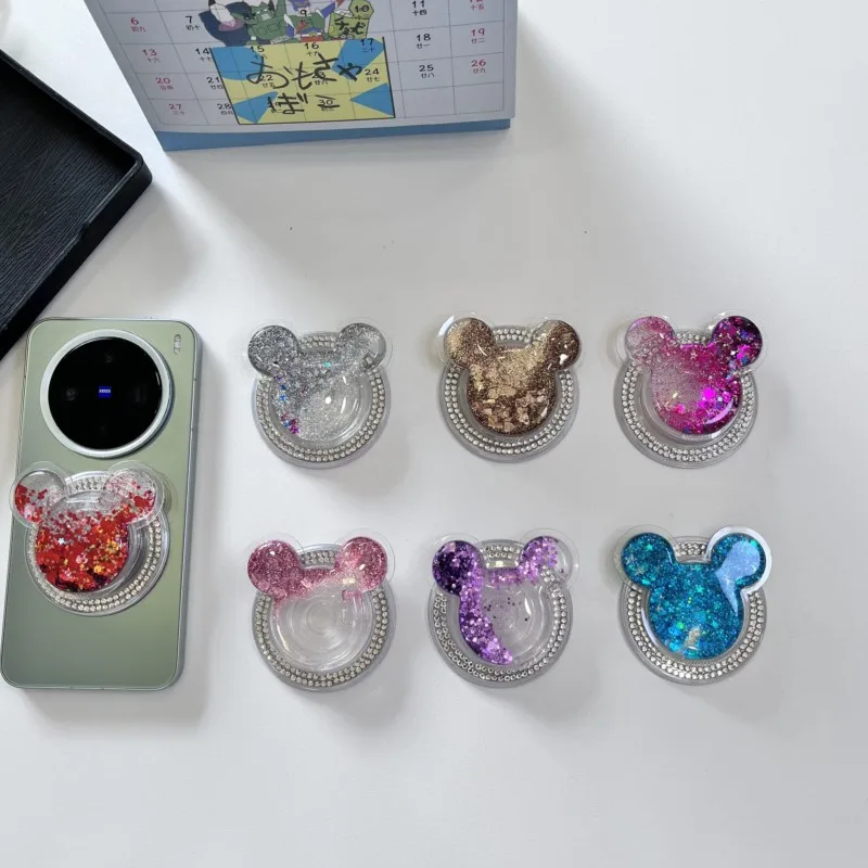 Блестящая подставка-держатель для телефона Disney Mickey Mouse с эффектом зыбучих песков, со стразами, складная, для магнитного крепления MagSafe
Блестящая подставка-держатель для телефона Disney Mickey Mouse с эффектом зыбучих песков, со стразами, складная, для магнитного крепления MagSafe