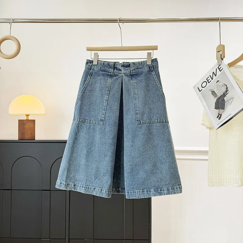 Nordic Minimalist A-Line Skirt with Pockets High Waist Pleated Loose Silhouette Denim Skirt for Women Summer 2026
Nordic Minimalist A-Line Skirt with Pockets High Waist Pleated Loose Silhouette Denim Skirt for Women Summer 2026