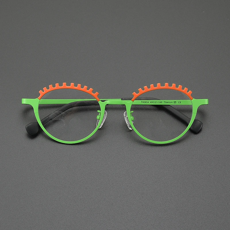 Niche artsy designer cat-eye oval glasses frame ultralight titanium retro fashion color-changing optical prescription glasses
Niche artsy designer cat-eye oval glasses frame ultralight titanium retro fashion color-changing optical prescription glasses