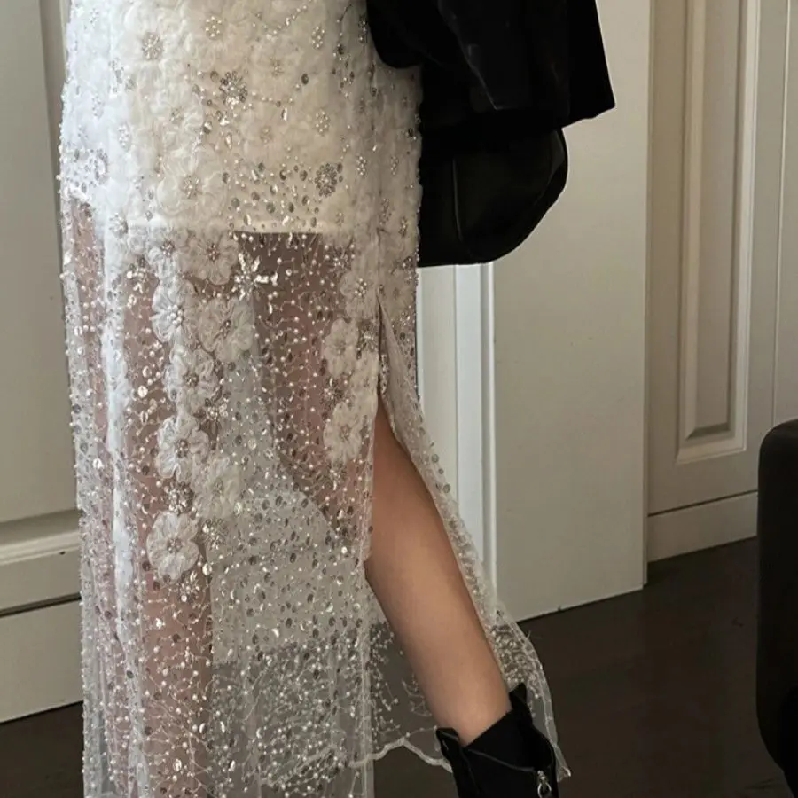 Белая юбка с блестками и бисером для тяжелой промышленности, женская 2026, весенняя фея, темперамент, расширенное сетчатое длинное платье с запахом на бедрах
Белая юбка с блестками и бисером для тяжелой промышленности, женская 2026, весенняя фея, темперамент, расширенное сетчатое длинное платье с запахом на бедрах