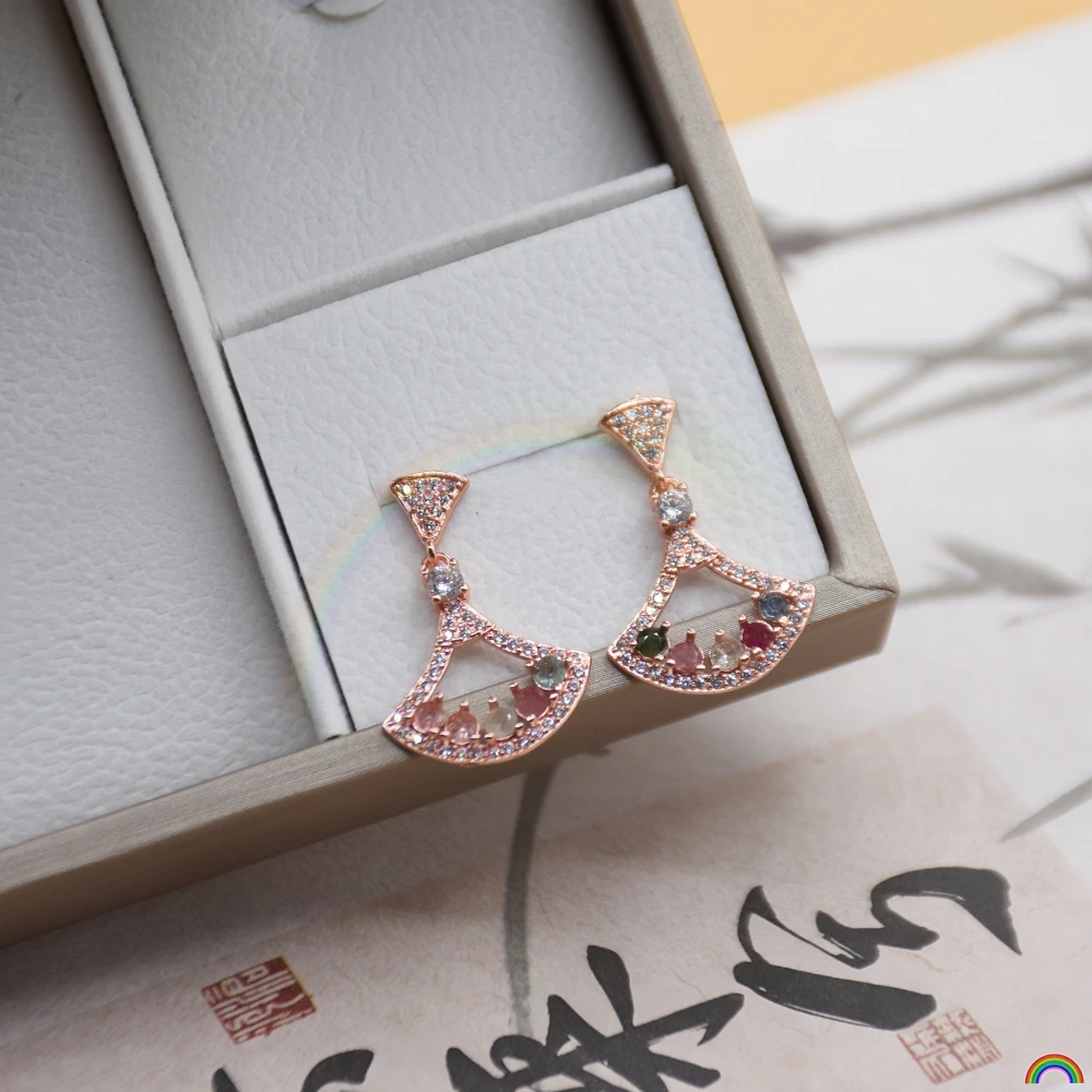 Natural tourmaline small skirt earrings, women's style, colorful gemstone earrings, Rwbuye brand jewelry design
Natural tourmaline small skirt earrings, women's style, colorful gemstone earrings, Rwbuye brand jewelry design