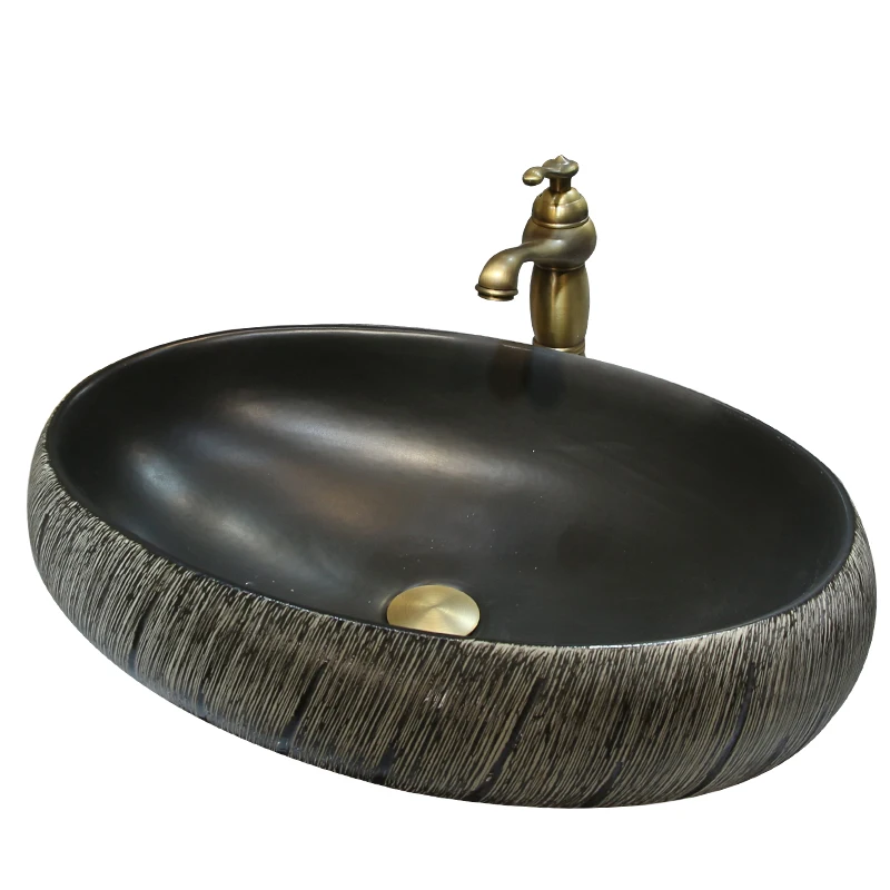 Creative art ceramic wash basin industrial style simple table basin retro household small basin
Creative art ceramic wash basin industrial style simple table basin retro household small basin