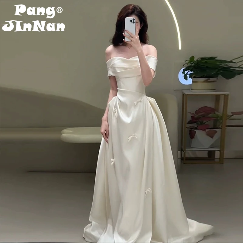 PJN 2025 Off Shoulder Wedding Dress With Bow Bride White Satin Reception Snapshot Dresses Women Formal Long Evening Party Dress
PJN 2025 Off Shoulder Wedding Dress With Bow Bride White Satin Reception Snapshot Dresses Women Formal Long Evening Party Dress