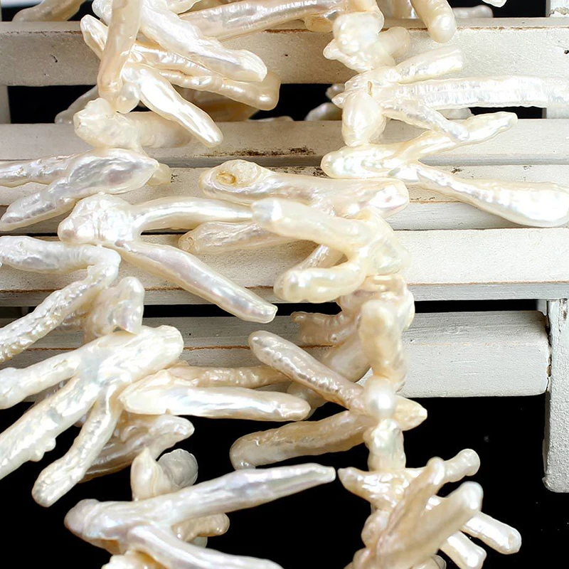 20-35 мм натуральный пресноводный культивированный жемчуг в стиле барокко, бусины неправильной формы в форме куриного когтя, белый жемчуг, аксессуары для изготовления ювелирных изделий своими руками
20-35 мм натуральный пресноводный культивированный жемчуг в стиле барокко, бусины неправильной формы в форме куриного когтя, белый жемчуг, аксессуары для изготовления ювелирных изделий своими руками