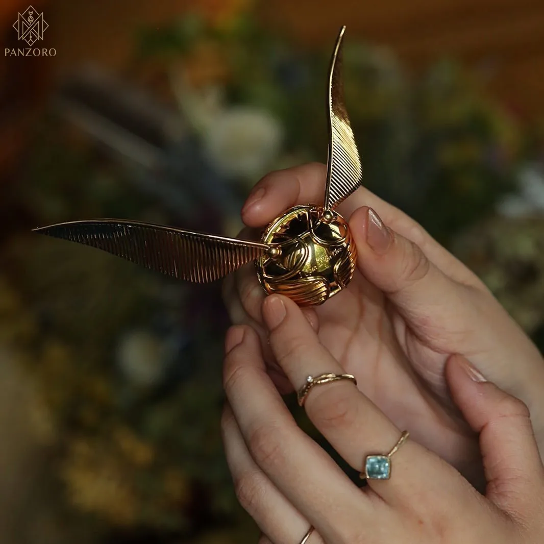 Panzoro Harry Potter peripheral, golden snitch ring box creative ornament, gift, wings movable
Panzoro Harry Potter peripheral, golden snitch ring box creative ornament, gift, wings movable