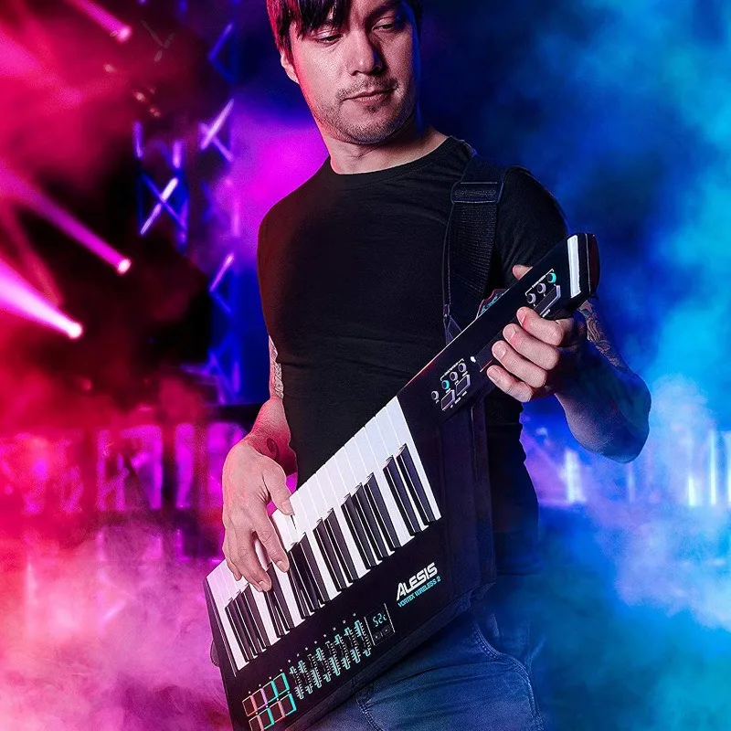 High-Performance USB MIDI Wireless Keytar Controller with Professional Software Suite Included,Black
High-Performance USB MIDI Wireless Keytar Controller with Professional Software Suite Included,Black