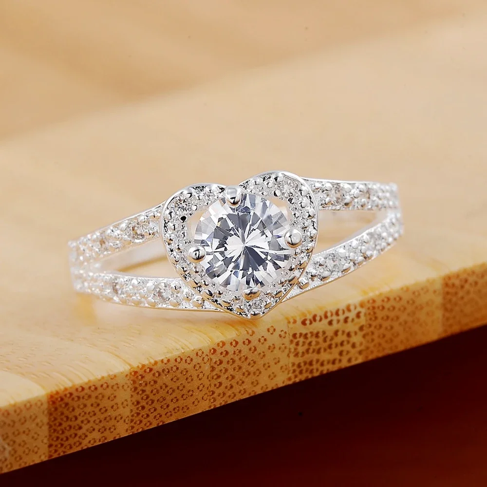 New 925 Sterling Silver Rings For Women Shining crystal heart Fashion Party Gifts Girl student luxury Charm wedding Jewelry
New 925 Sterling Silver Rings For Women Shining crystal heart Fashion Party Gifts Girl student luxury Charm wedding Jewelry